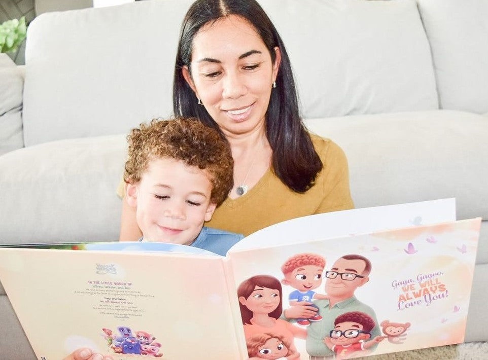 A grandmother reading a Hooray Heroes personalized book for up to three grandchildren to her grandson.