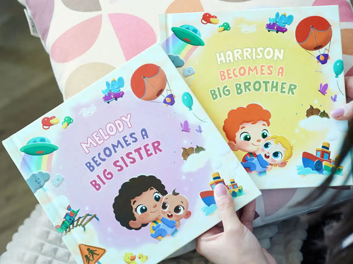 Beautiful personalized cover featuring the older sibling and a newborn.