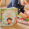 A boy with his custom grieving book to help cope with death.