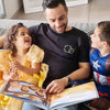 Kids are laughing at father who is reading their personalized book for Father's day.