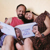 Woman and her dad enjoy reading their personalized dad book.
