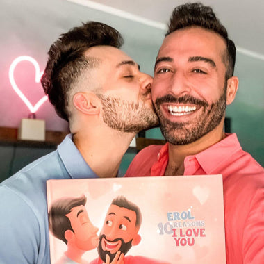 Two boyfriends with their personalized lovebook from Hooray Heroes. Perfect for Valentine's day!