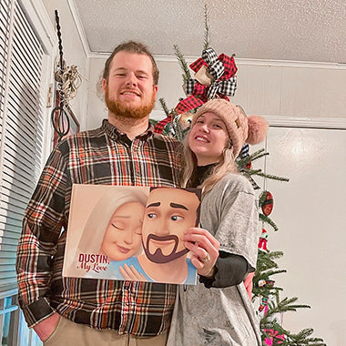 A couple smiles in front of an Xmas tree with their own custom couples' book for him, an amazing gift for boyfriends.