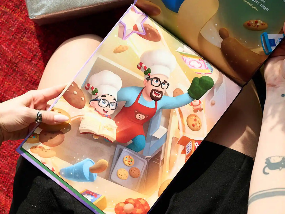 An illustration from a personalized xmas book where daddy and his little one make cookies.