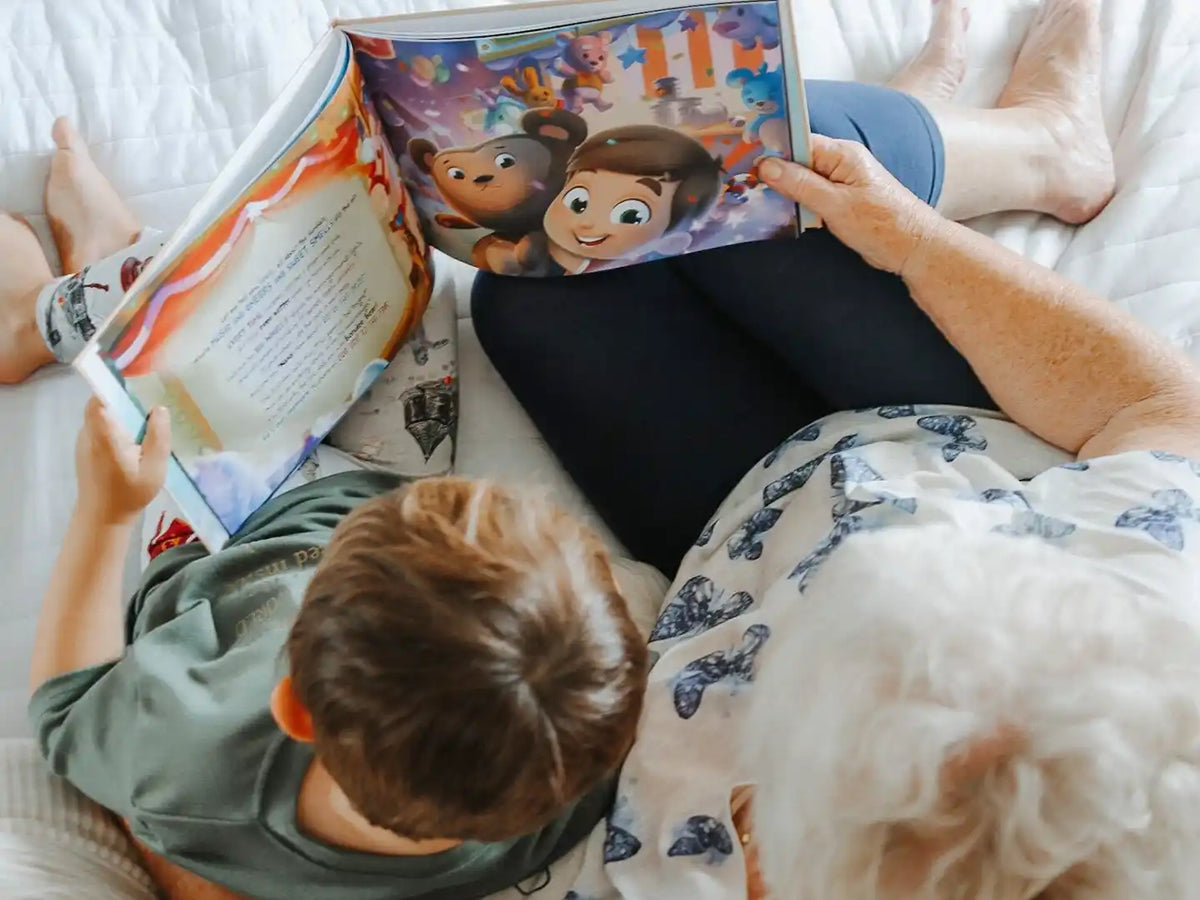 A grandma and her grandson reading their personalized book starring them as the characters.