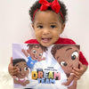 A little girl holds up a customized book of her and her siblings all about the fun they have together.