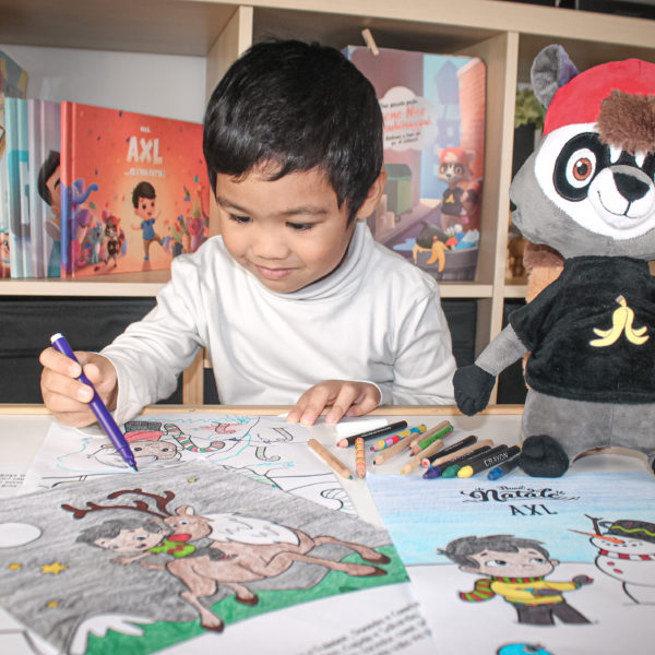 A little boy coloring-in Hooray Heroes All Seasons Free Printable.