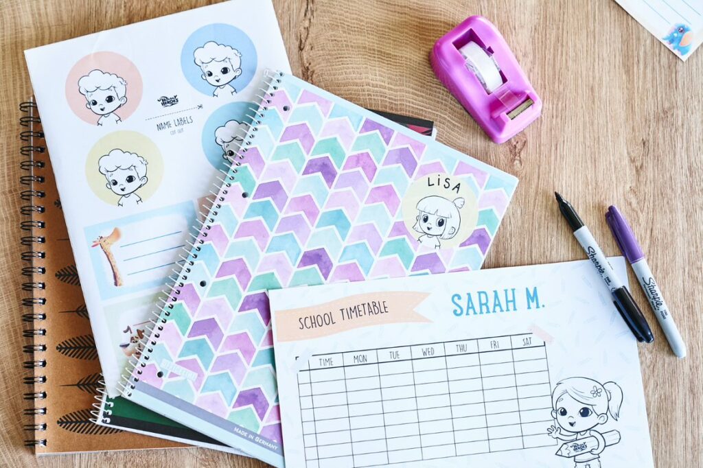 Personalized week planners and name tags by Hooray Heroes.