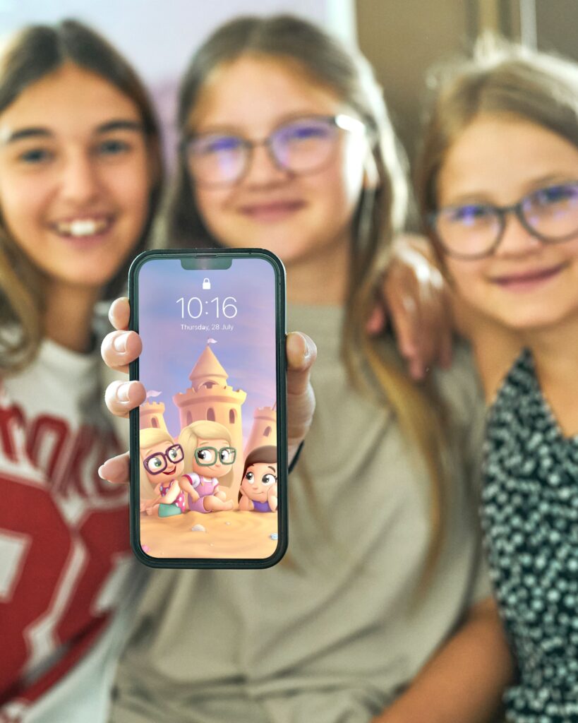 Three kids with their own mobile wallpaper for three kids from Hooray Heroes. 