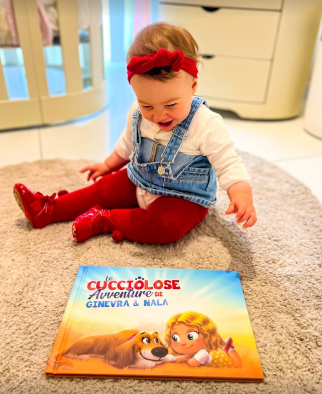 A baby girl named Ginevra with a personalized book for children and pets by Hooray Heroes.