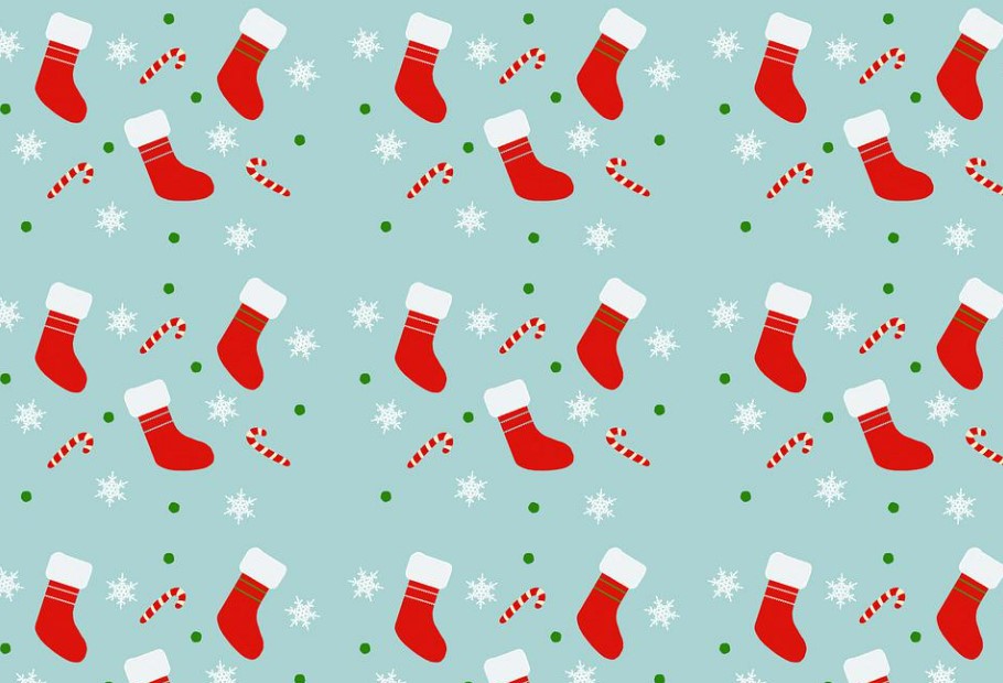 An illustrated picture of Christmas stockings, candy canes and snowflakes.