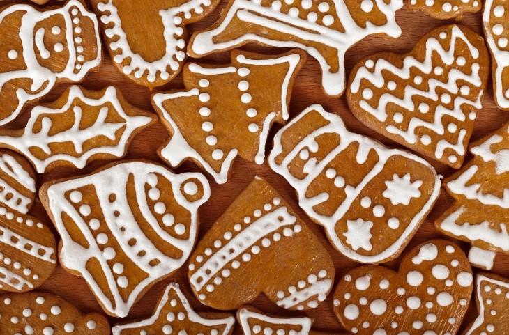 A large platter of iced gingerbread cookies.