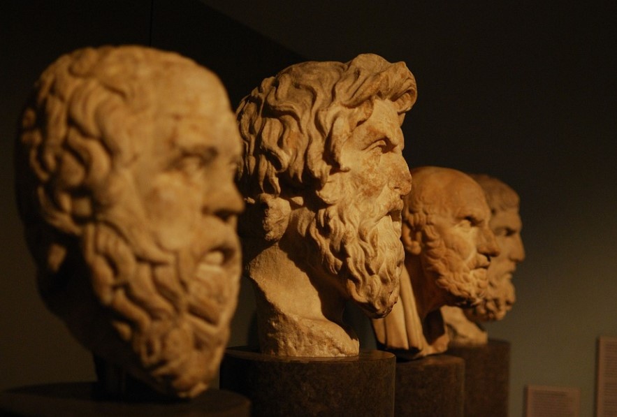 A series of stone busts, one of which is Aristotle. 
