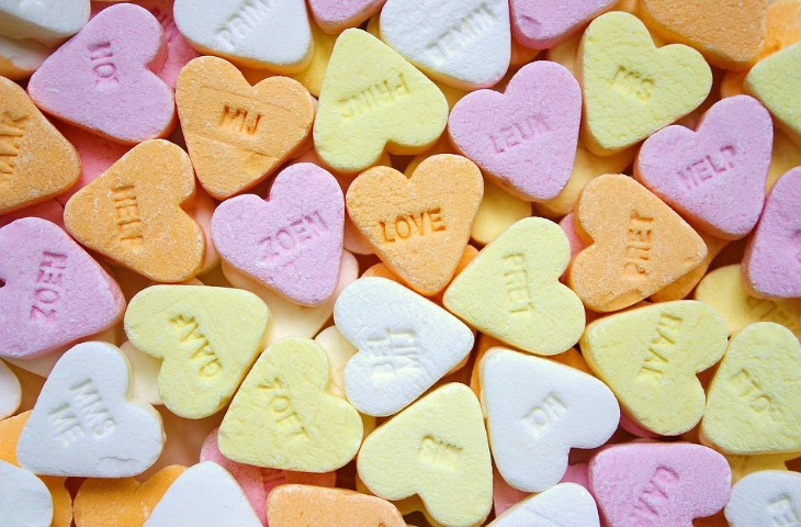 Lots of sweetheart valentine's candy in a variety of colors. 
